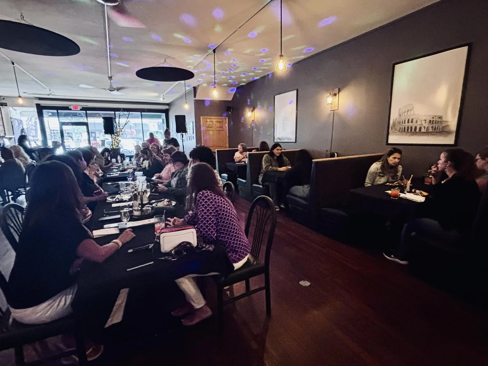 Guests dining in Cambria's warm bar and dining room
